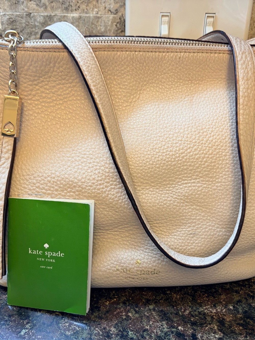 Kate Spade Cream Pebbled Leather Shoulder Bag with Gold Accent